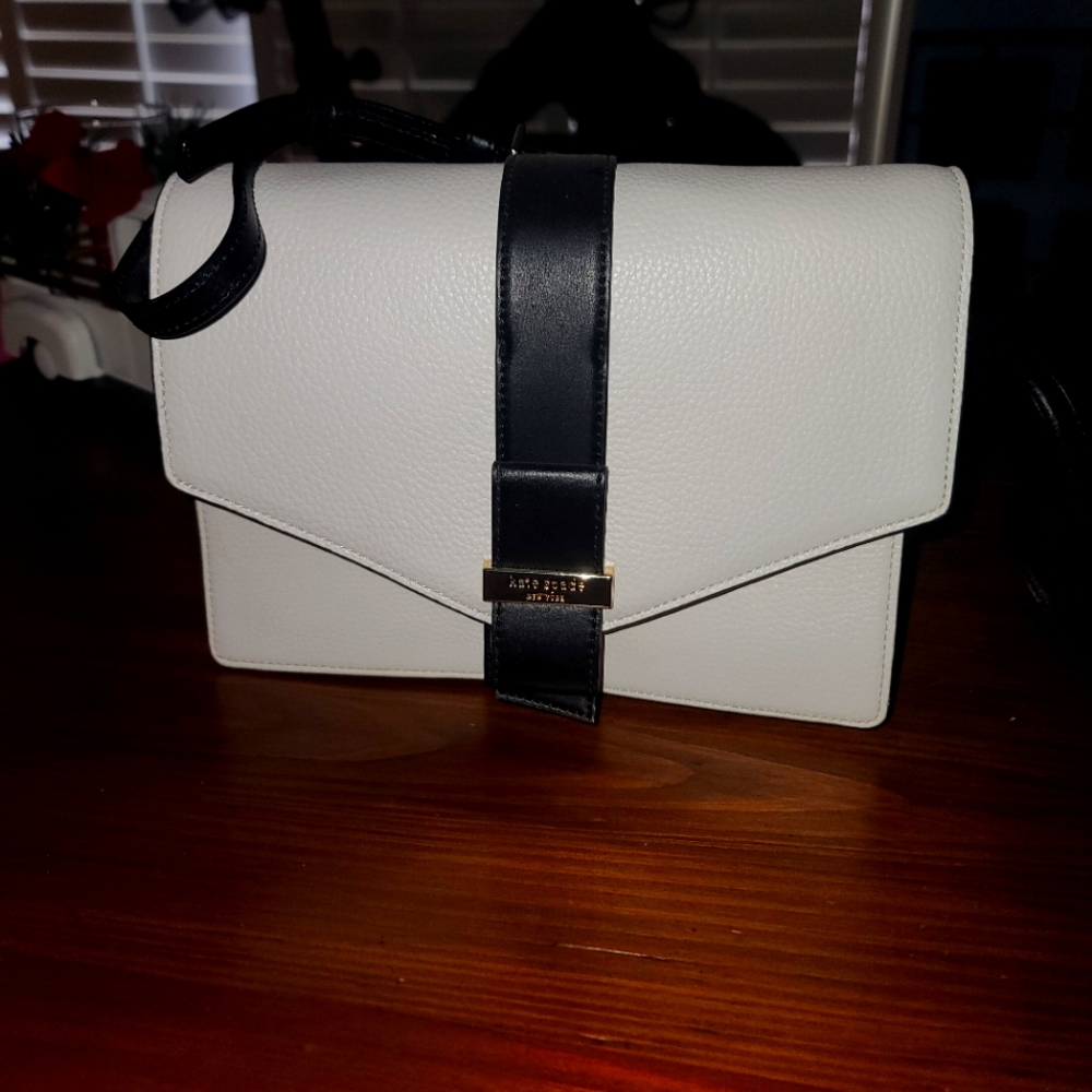 white and black Kate spade handbag